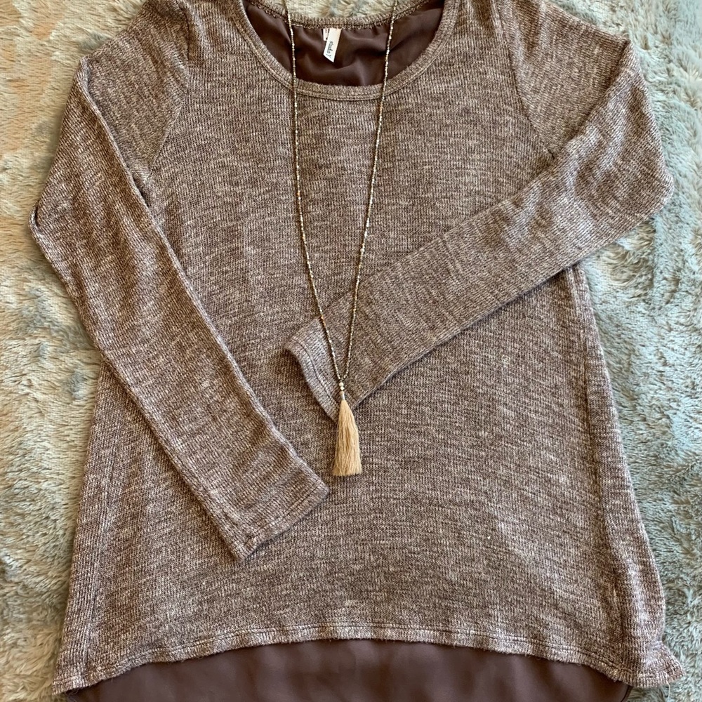 Purple long sleeved blouse